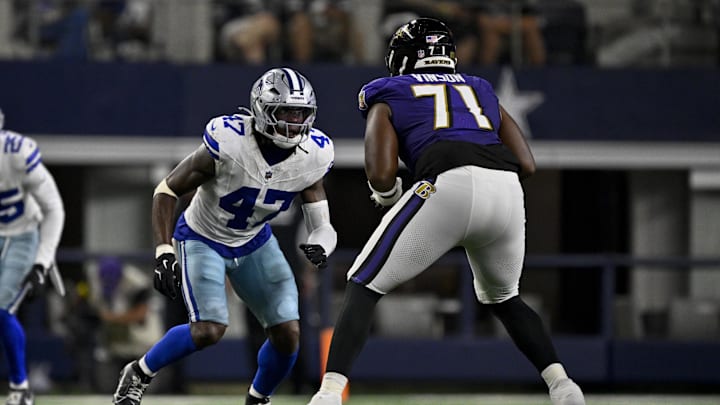 Aug 16, 2025; Arlington, Texas, USA; Dallas Cowboys linebacker Darius Harris (47) and Baltimore Ravens offensive tackle Carson Vinson (71) in action during the game between the Dallas Cowboys and the Baltimore Ravens at AT&T Stadium. Mandatory Credit: Jerome Miron-Imagn Images
