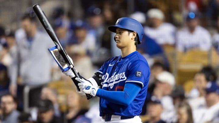 Los Angeles Dodgers designated hitter Shohei Ohtani (17) against the Los Angeles Angels during a spring training game at Camelback Ranch-Glendale. 