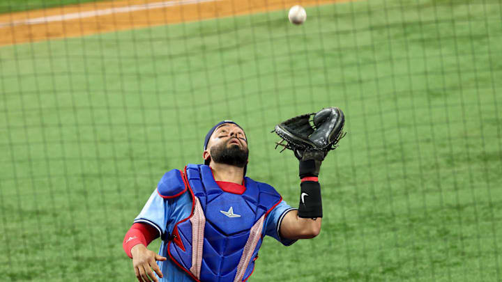 May 28, 2025; Arlington, Texas, USA; Toronto Blue Jays catcher Ali Sanchez (20) makes a catch during the eighth inningagainst the Texas Rangers at Globe Life Field. Mandatory Credit: Kevin Jairaj-Imagn Images May 28, 2025; Arlington, Texas, USA; Toronto Blue Jays catcher Ali Sanchez (20) makes a catch during the eighth inningagainst the Texas Rangers at Globe Life Field. Mandatory Credit: Kevin Jairaj-Imagn Images