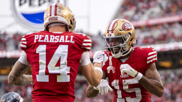 November 17, 2024; Santa Clara, California, USA; San Francisco 49ers wide receiver Jauan Jennings (15) celebrates with wide receiver Ricky Pearsall (14) against the Seattle Seahawks during the fourth quarter at Levi's Stadium. Mandatory Credit: Kyle Terada-Imagn Images
