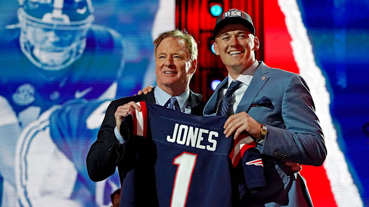 Apr 29, 2021; Cleveland, Ohio, USA; Mac Jones (Alabama) with NFL commissioner Roger Goodell after being selected by the New England Patriots as the number 15 overall pick in the first round of the 2021 NFL Draft at First Energy Stadium. Mandatory Credit: Kirby Lee-Imagn Images Apr 29, 2021; Cleveland, Ohio, USA; Mac Jones (Alabama) with NFL commissioner Roger Goodell after being selected by the New England Patriots as the number 15 overall pick in the first round of the 2021 NFL Draft at First Energy Stadium. Mandatory Credit: Kirby Lee-Imagn Images