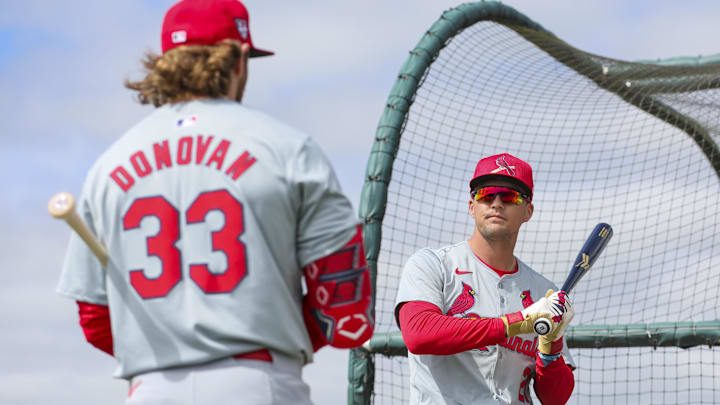 Feb 19, 2024; Jupiter, FL, USA; St. Louis Cardinals center fielder Lars Nootbaar (21) talks to