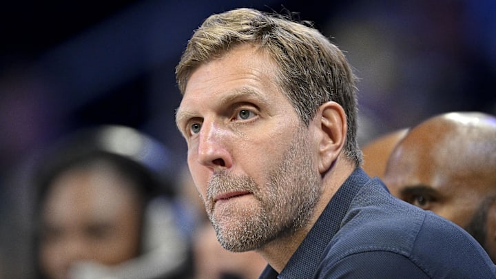 May 19, 2025; Arlington, Texas, USA;  Former NBA player Dirk Nowitzki watches the game between the Dallas Wings and the Seattle Storm during the first half at College Park Center. Mandatory Credit: Jerome Miron-Imagn Images