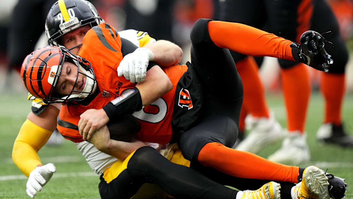 Pittsburgh Steelers linebacker T.J. Watt (90) sacks Cincinnati Bengals quarterback Jake Browning (6) in the fourth quarter of a Week 12 NFL football game between the Pittsburgh Steelers and the Cincinnati Bengals, Sunday, Nov. 26, 2023, at Paycor Stadium.