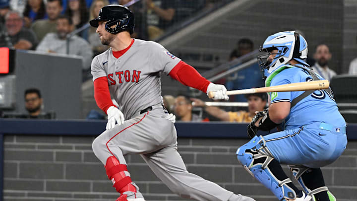Sep 24, 2025; Toronto, Ontario, CAN;  Boston Red Sox third baseman Alex Bregman (2) hits a single against the Toronto Blue Jays in the first inning at Rogers Centre. Mandatory Credit: Dan Hamilton-Imagn Images