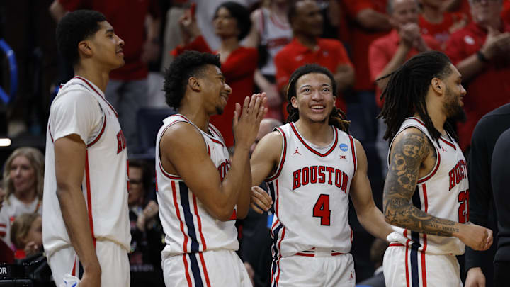 Mar 21, 2026; Oklahoma City, OK, USA; The Houston Cougars react after defeating the Texas A&M Aggies in a second round game of the men's 2026 NCAA Tournament at Paycom Center. Mandatory Credit: Alonzo Adams-Imagn Images Mar 21, 2026; Oklahoma City, OK, USA; The Houston Cougars react after defeating the Texas A&M Aggies in a second round game of the men's 2026 NCAA Tournament at Paycom Center. Mandatory Credit: Alonzo Adams-Imagn Images