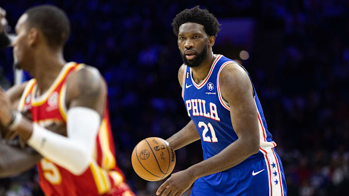 Nov 28, 2022; Philadelphia, Pennsylvania, USA; Philadelphia 76ers center Joel Embiid (21) dribbles the ball against the Atlanta Hawks during the fourth quarter at Wells Fargo Center. Mandatory Credit: Bill Streicher-Imagn Images