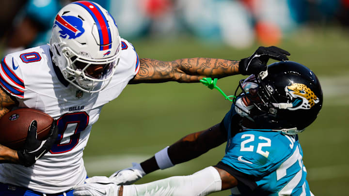 Buffalo Bills wide receiver Keon Coleman stiff arms Jacksonville Jaguars cornerback Jarrian Jones during the second quarter of a Wild Card matchup.