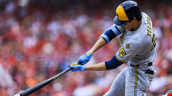 Aug 17, 2025; Cincinnati, Ohio, USA; Milwaukee Brewers outfielder Christian Yelich (22) bats against the Cincinnati Reds in the ninth inning at Great American Ball Park. Mandatory Credit: Katie Stratman-Imagn Images