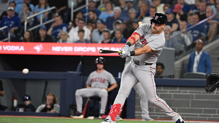Sep 23, 2025; Toronto, Ontario, CAN; Boston Red Sox first baseman Nathaniel Lowe (37) hits a RBI single against the Toronto Blue Jays in the sixth inning at Rogers Centre. Mandatory Credit: Dan Hamilton-Imagn Images Sep 23, 2025; Toronto, Ontario, CAN; Boston Red Sox first baseman Nathaniel Lowe (37) hits a RBI single against the Toronto Blue Jays in the sixth inning at Rogers Centre. Mandatory Credit: Dan Hamilton-Imagn Images