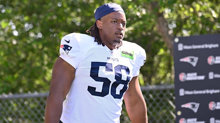 Jul 28, 2025; Foxborough, MA, USA; New England Patriots center Jared Wilson (58) heads to the practice fields for training camp at Gillette Stadium. Mandatory Credit: Eric Canha-Imagn Images