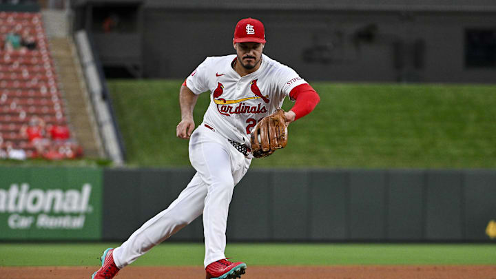 Sep 16, 2024; St. Louis, Missouri, USA;  St. Louis Cardinals third baseman Nolan Arenado (28) fields a ground ball against the Pittsburgh Pirates during the first inning at Busch Stadium. Mandatory Credit: Jeff Curry-Imagn Images