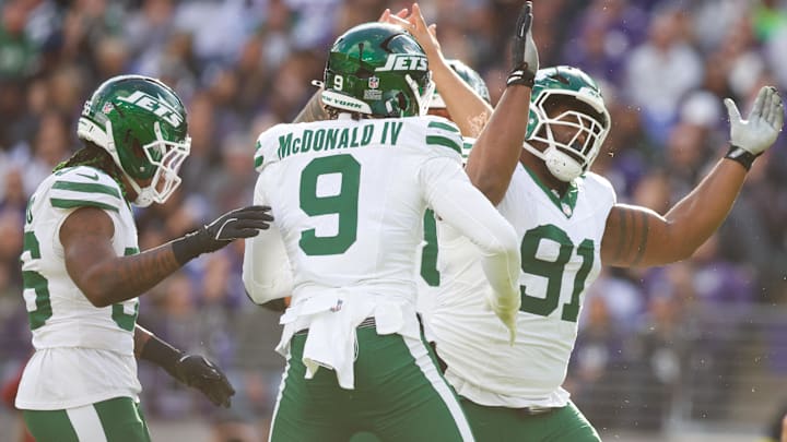 Nov 23, 2025; Baltimore, Maryland, USA; New York Jets defensive tackle Jowon Briggs (91) and New York Jets defensive end Will McDonald IV (9) celebrate a sack during the second quarter against the Baltimore Ravens at M&T Bank Stadium. Mandatory Credit: Peter Casey-Imagn Images