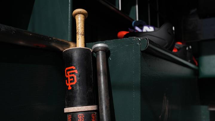 Mar 27, 2026; San Francisco, California, USA; Batting equipment with the San Francisco Giants logo sits in the dugout before the game against the New York Yankees at Oracle Park. Mandatory Credit: Darren Yamashita-Imagn Images