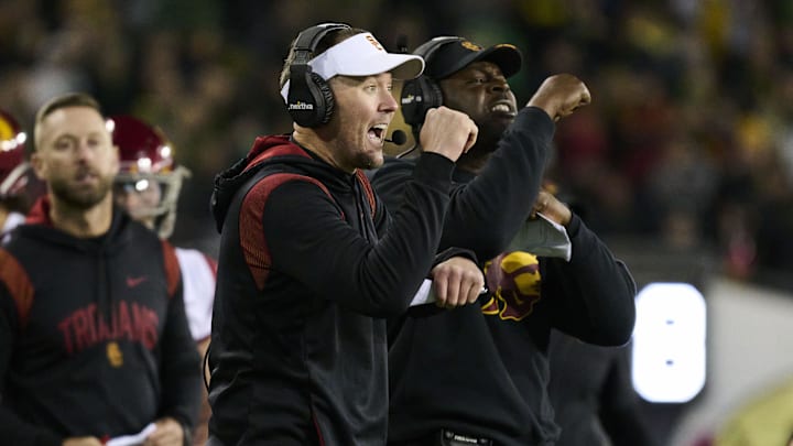 Nov 11, 2023; Eugene, Oregon, USA; USC Trojans head coach Lincoln Riley signals to the offense during the second half against the Oregon Ducks at Autzen Stadium. Mandatory Credit: Troy Wayrynen-USA TODAY Sports