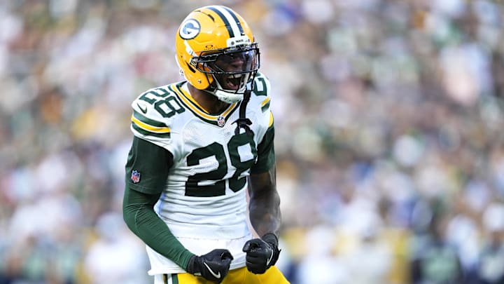 Aug 23, 2025; Green Bay, Wisconsin, USA; Green Bay Packers linebacker Isaiah Simmons (28) reacts to tackling Seattle Seahawks running back Jacardia Wright (31) during the second half at Lambeau Field.