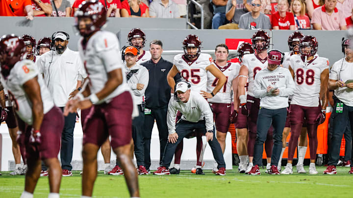 Sep 27, 2025; Raleigh, N.C.; Virginia Tech interim head coach Philip Montgomery shouts to his team during the first half against N.C. State. Sep 27, 2025; Raleigh, N.C.; Virginia Tech interim head coach Philip Montgomery shouts to his team during the first half against N.C. State.