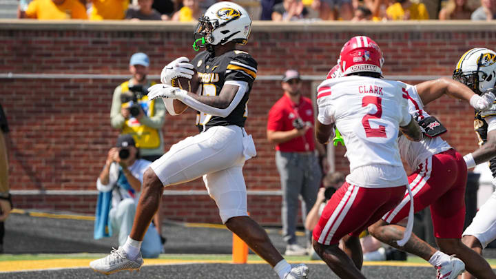 Missouri Tigers running back Jamal Roberts (20) scores a touchdown, in a game against the Louisiana-Lafayette Ragin' Cajuns this season.