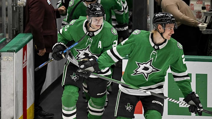 Apr 11, 2024; Dallas, Texas, USA; Dallas Stars center Roope Hintz (24) and defenseman Esa Lindell (23) skate in warms up prior to a game against against the Winnipeg Jets at the American Airlines Center. Mandatory Credit: Jerome Miron-Imagn Images