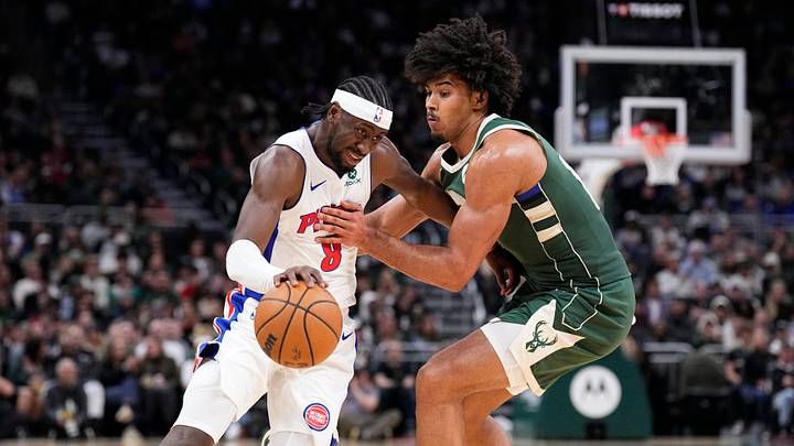 Nov 22, 2025; Milwaukee, Wisconsin, USA; Detroit Pistons guard Caris Levert (8) drives against Milwaukee Bucks center Jericho Sims (00) in the second half at Fiserv Forum. Mandatory Credit: Michael McLoone-Imagn Images Nov 22, 2025; Milwaukee, Wisconsin, USA; Detroit Pistons guard Caris Levert (8) drives against Milwaukee Bucks center Jericho Sims (00) in the second half at Fiserv Forum. Mandatory Credit: Michael McLoone-Imagn Images
