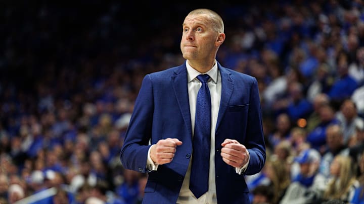Nov 22, 2024; Lexington, Kentucky, USA; Kentucky Wildcats head coach Mark Pope celebrates during the second half against the Jackson State Tigers at Rupp Arena at Central Bank Center. Mandatory Credit: Jordan Prather-Imagn Images Nov 22, 2024; Lexington, Kentucky, USA; Kentucky Wildcats head coach Mark Pope celebrates during the second half against the Jackson State Tigers at Rupp Arena at Central Bank Center. Mandatory Credit: Jordan Prather-Imagn Images
