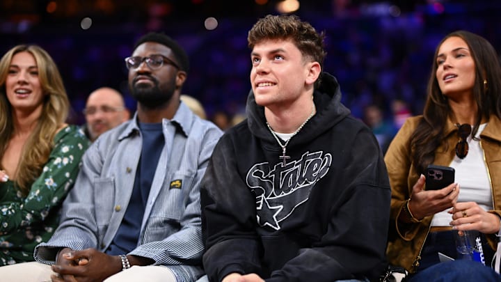 Feb 11, 2025; Philadelphia, Pennsylvania, USA; Philadelphia Eagles Cooper DeJean looks on during the game between the Philadelphia 76ers and the Toronto Raptors at Wells Fargo Center. Mandatory Credit: Kyle Ross-Imagn Images