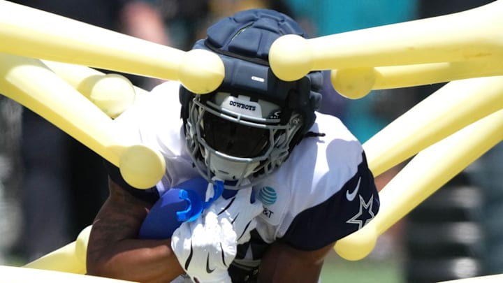 Dallas Cowboys running back Jaydon Blue carries the ball at training camp at the River Ridge Fields.