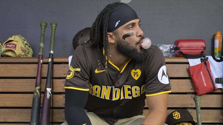 Oct 11, 2024; Los Angeles, California, USA; San Diego Padres outfielder Fernando Tatis Jr. (23) looks on in the dugout before game five against the Los Angeles Dodgers in the NLDS for the 2024 MLB Playoffs at Dodger Stadium. Mandatory Credit: Jayne Kamin-Oncea-Imagn Images Oct 11, 2024; Los Angeles, California, USA; San Diego Padres outfielder Fernando Tatis Jr. (23) looks on in the dugout before game five against the Los Angeles Dodgers in the NLDS for the 2024 MLB Playoffs at Dodger Stadium. Mandatory Credit: Jayne Kamin-Oncea-Imagn Images