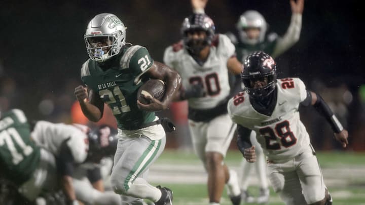 De La Salle's Dominic Kelley breaks free on a go-ahead and ultimately game-winning 35-yard touchdown run in the fourth quarter while QB Brayden Knight signals touchdown en route to a tough 10-7 victory over Pittsburg in the CIF North Coast Section Open Division title game at Diablo Valley College on Nov. 22. | Photo: Dennis Lee