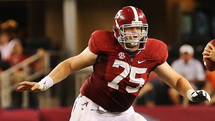 Sep 1, 2012; Arlington, TX, USA; Alabama Crimson Tide offensive linesman Barrett Jones (75) blocks during the game against the Michigan Wolverines at Cowboys Stadium. Alabama won 41-14. Mandatory Credit: Kevin Jairaj-Imagn Images Sep 1, 2012; Arlington, TX, USA; Alabama Crimson Tide offensive linesman Barrett Jones (75) blocks during the game against the Michigan Wolverines at Cowboys Stadium. Alabama won 41-14. Mandatory Credit: Kevin Jairaj-Imagn Images