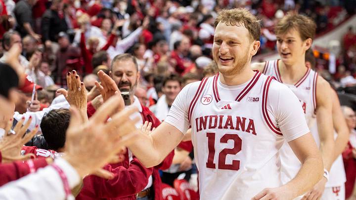 Indiana's Tucker DeVries (12) celebrates after the Indiana versus Wisconsin men's basketball game at Simon Skjodt Assembly Hall on Saturday, Feb. 7, 2026.