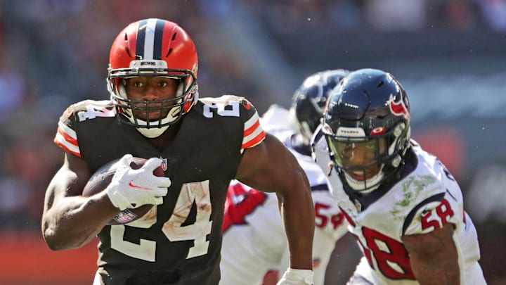 Cleveland Browns running back Nick Chubb (24) rushes for a touchdown ahead of Houston Texans outside linebacker Christian Kirksey (58) during the second half of an NFL football game, Sunday, Sept. 19, 2021, in Cleveland, Ohio. [Jeff Lange/Beacon Journal]

Browns 18