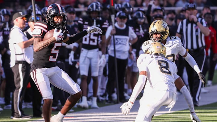 Texas Tech's Caleb Douglas makes a catch against UCF during a Big 12 Conference football game, Saturday, Nov. 15, 2025, at Jones AT&T Stadium. Texas Tech's Caleb Douglas makes a catch against UCF during a Big 12 Conference football game, Saturday, Nov. 15, 2025, at Jones AT&T Stadium.