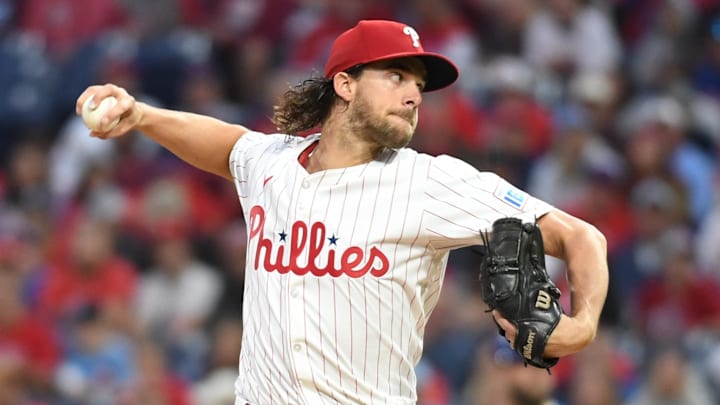 Sep 23, 2024; Philadelphia, Pennsylvania, USA; Philadelphia Phillies pitcher Aaron Nola (27) throws a pitch during the first inning against the Chicago Cubs at Citizens Bank Park. 
