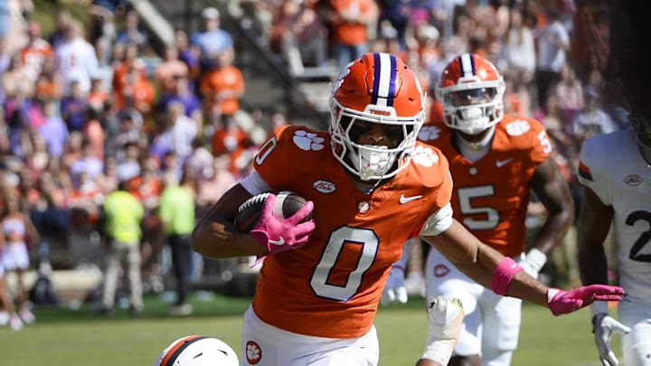 Oct 19, 2024; Clemson, South Carolina, USA; Clemson Tigers wide receiver Antonio Williams (0) runs the ball against the Virginia Cavaliers at Memorial Stadium. Oct 19, 2024; Clemson, South Carolina, USA; Clemson Tigers wide receiver Antonio Williams (0) runs the ball against the Virginia Cavaliers at Memorial Stadium.