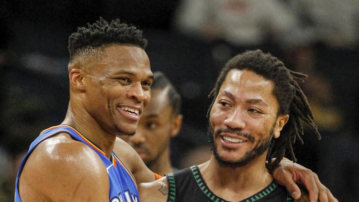 Oklahoma City Thunder guard Russell Westbrook (0) and Minnesota Timberwolves guard Derrick Rose (25).