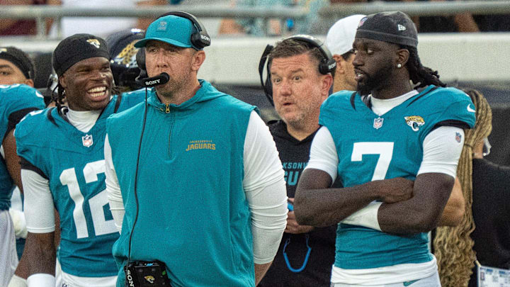Jacksonville Jaguars wide receiver Travis Hunter (12) has a laugh with Jacksonville Jaguars wide receiver Brian Thomas Jr. (7) during the first half of the first preseason game as Head Coach Liam Coen coaches from the sideline where the Jacksonville Jaguars hosted the Pittsburgh Steelers Saturday Aug. 9, 2025, at EverBank Stadium in Jacksonville, Fla. [Doug Engle/Florida Times-Union]