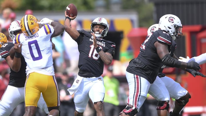 South Carolina quarterback LaNorris Sellers (16) passes near Louisiana State University defensive end Paris Shand (0) during the first quarter at Williams-Brice Stadium in Columbia, S.C. Saturday, September 14, 2024.