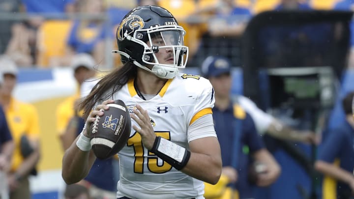 Aug 31, 2024; Pittsburgh, Pennsylvania, USA; Kent State Golden Flashes quarterback Devin Kargman passes the ball during the second quarter at Acrisure Stadium.
