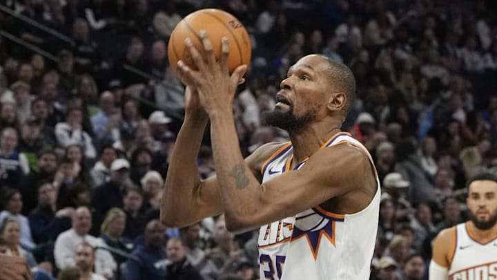 Mar 28, 2025; Minneapolis, Minnesota, USA; Phoenix Suns forward Kevin Durant (35) shoots against the Minnesota Timberwolves in the third quarter at Target Center. Mandatory Credit: Bruce Kluckhohn-Imagn Images