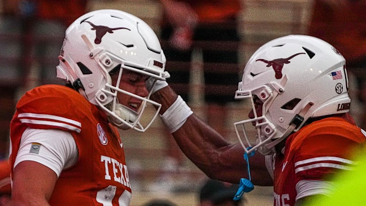 Texas Longhorns quarterback Arch Manning and receiver DeAndre Moore Jr.