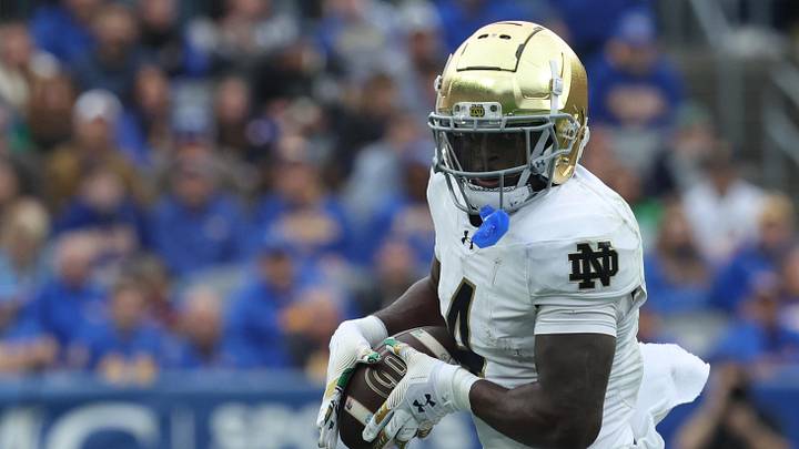 Nov 15, 2025; Pittsburgh, Pennsylvania, USA;  Notre Dame Fighting Irish running back Jeremiyah Love (4) runs after a catch against the Pittsburgh Panthers during the second quarter at Acrisure Stadium. Mandatory Credit: Charles LeClaire-Imagn Images