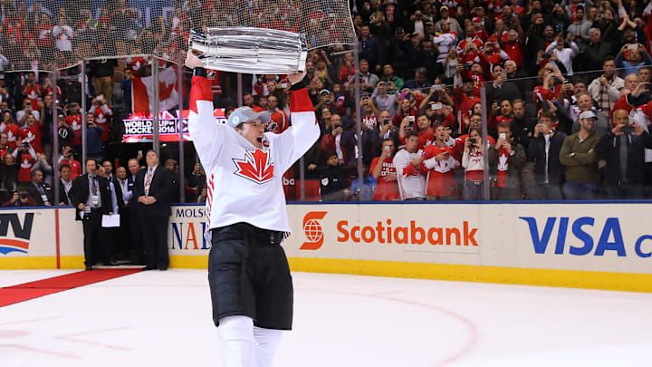 Sep 29, 2016; Toronto, Ontario, Canada; Team Canada center Sidney Crosby (87) holds up the World Cup of Hockey championship trophy after defeating Team Europe 2-1 in game two of the World Cup of Hockey final at Air Canada Centre. Mandatory Credit: Bruce Bennett/Pool Photo via Imagn Images