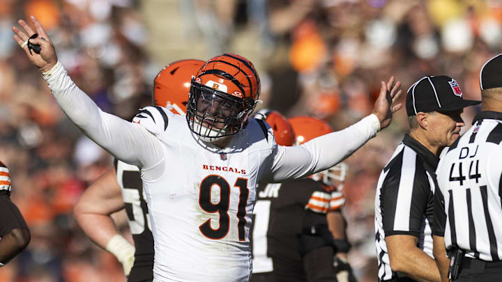 Oct 20, 2024; Cleveland, Ohio, USA; Cincinnati Bengals defensive end Trey Hendrickson (91) reacts following penalty flags being thrown during the fourth quarter against the Cleveland Browns at Huntington Bank Field. The penalties were against the Browns. Mandatory Credit: Scott Galvin-Imagn Images Oct 20, 2024; Cleveland, Ohio, USA; Cincinnati Bengals defensive end Trey Hendrickson (91) reacts following penalty flags being thrown during the fourth quarter against the Cleveland Browns at Huntington Bank Field. The penalties were against the Browns. Mandatory Credit: Scott Galvin-Imagn Images