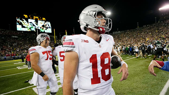 Oct 12, 2024; Eugene, Oregon, USA; Ohio State Buckeyes quarterback Will Howard (18) walks off the field after losing 32-31 to Oregon Ducks during the NCAA football game at Autzen Stadium.