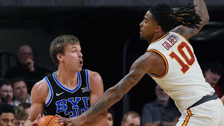 Iowa State Cyclones guard Keshon Gilbert (10) tries to nocks the ball out from BYU Cougars's guard Dallin Hall (30) during the first half of the Big-12 men’s basketball in the Senior Day at Hilton Coliseum on March 4, 2025, in Ames, Iowa. Iowa State Cyclones guard Keshon Gilbert (10) tries to nocks the ball out from BYU Cougars's guard Dallin Hall (30) during the first half of the Big-12 men’s basketball in the Senior Day at Hilton Coliseum on March 4, 2025, in Ames, Iowa.