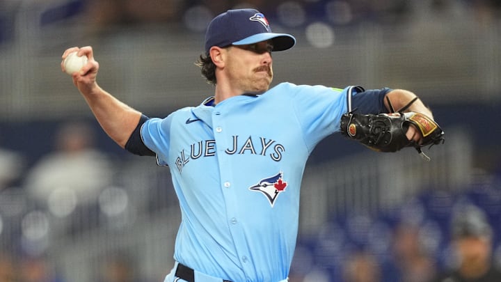 Aug 22, 2025; Miami, Florida, USA; Toronto Blue Jays starting pitcher Shane Bieber (57) throws a pitch against the Miami Marlins at loanDepot Park. Mandatory Credit: Jim Rassol-Imagn Images