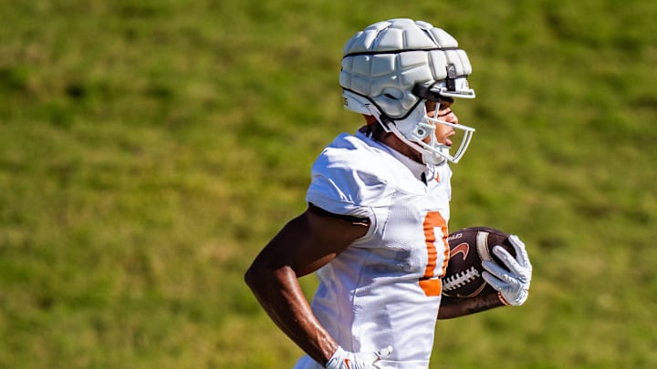 Texas Longhorns wide receiver DeAndre Moore Jr. (0) runs a drill during practice on the University of Texas campus in Austin, Dec. 27, 2024 ahead of the second round playoff game against Arizona State in the Peach Bowl on the New Years Day.