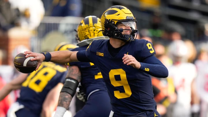 Nov 25, 2023; Ann Arbor, Michigan, USA; Michigan Wolverines quarterback J.J. McCarthy (9) throws during the second half of the NCAA football game against the Ohio State Buckeyes at Michigan Stadium. Ohio State lost 30-24. Nov 25, 2023; Ann Arbor, Michigan, USA; Michigan Wolverines quarterback J.J. McCarthy (9) throws during the second half of the NCAA football game against the Ohio State Buckeyes at Michigan Stadium. Ohio State lost 30-24.
