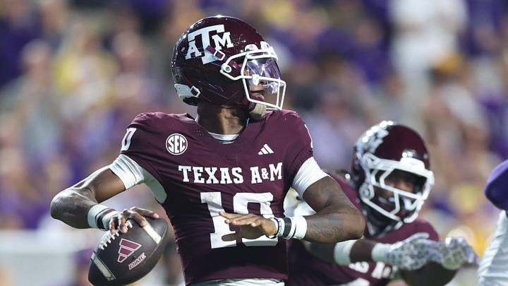 Texas A&M Aggies quarterback Marcel Reed drops to throw during the first half against the Louisiana State Tigers at Tiger Stadium. Texas A&M Aggies quarterback Marcel Reed drops to throw during the first half against the Louisiana State Tigers at Tiger Stadium.